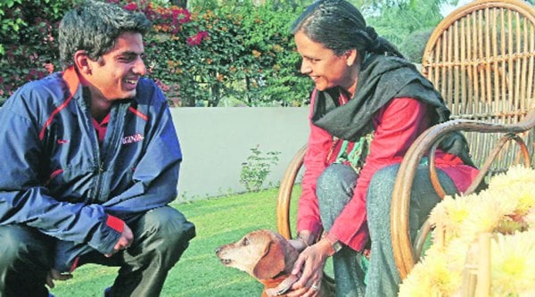 Sanam Singh with mother at their Sector 8 residence in Chandigarh. (R) Sanam in action. (Source: Express Archives)