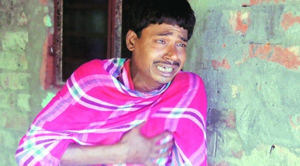 Bhola Pramanik and his mother Urmila lost Rs 30,000, savings of their lifteimes; she committed suicide last year.  ( Source: Express photo by Partha Paul )