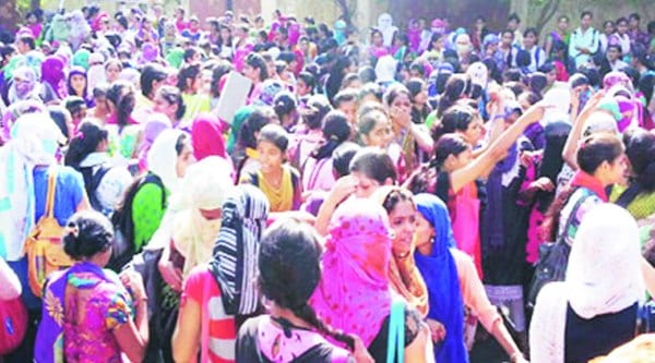 Students of Government College of Girls in Sector 14, Gurgaon, protest the incident on Monday.
