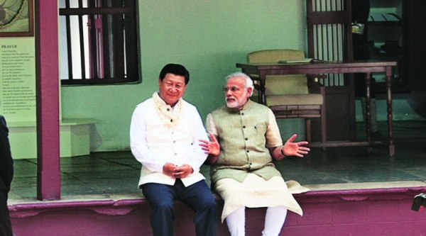 Prime Minister Narendra Modi and Chinese President Xi Jinping at Gandhi Ashram in Ahmedabad on Wednesday. EXPRESS