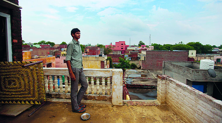 Zahid, on the terrace of his house. (Source: Express photo by Oinam Anand)