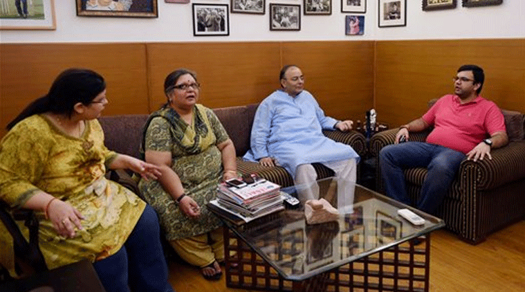 Finance Minister Arun Jaitley along with his family at his new official residence in New Delhi where he went after his discharge from the hospital on Monday. (Source: PTI photo)