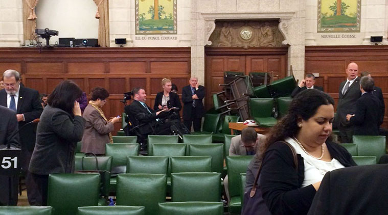 Security in Canada came under criticism after a gunman was able to run through the front door of parliament.