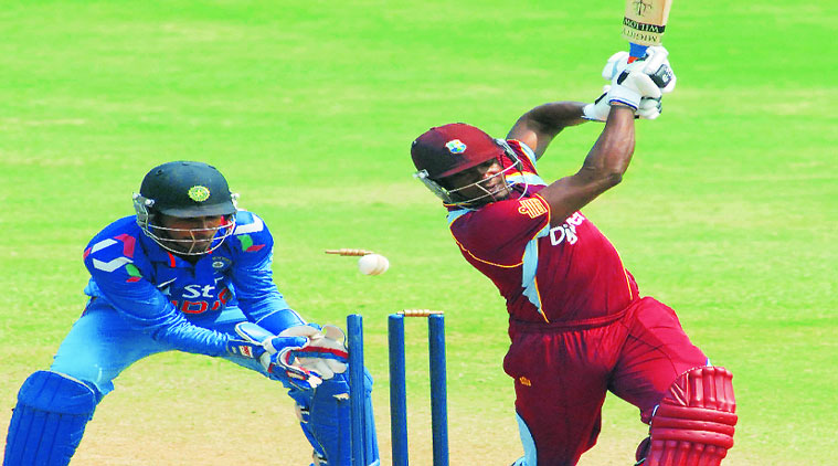Jerome Taylor is bowled by Amit Mishra, who finished with 3/26.  (Source: Express photo by Kevin D’Souza)
