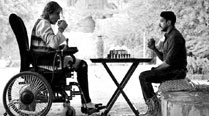Amitabh Bachchan and Farhan Akhtar contemplate their next move during a game of chess