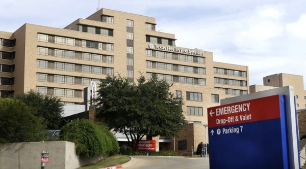 FILE - In this Oct. 8, 2014 file photo, a sign points to the entrance to the emergency room at Texas Health Presbyterian Hospital Dallas, where U.S. Ebola patient Thomas Eric Duncan was being treated, in Dallas. (Source: AP)