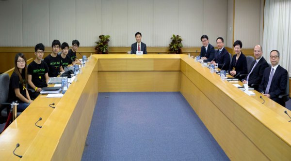 Hong Kong officials and student leaders hold talks on Tuesday to try to end the pro-democracy protests. (Source: AP)