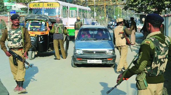 Security personnel check vehicles in Srinagar on Wednesday ahead of PM Narendra Modi’s visit.  Source:  Shahid Tantray