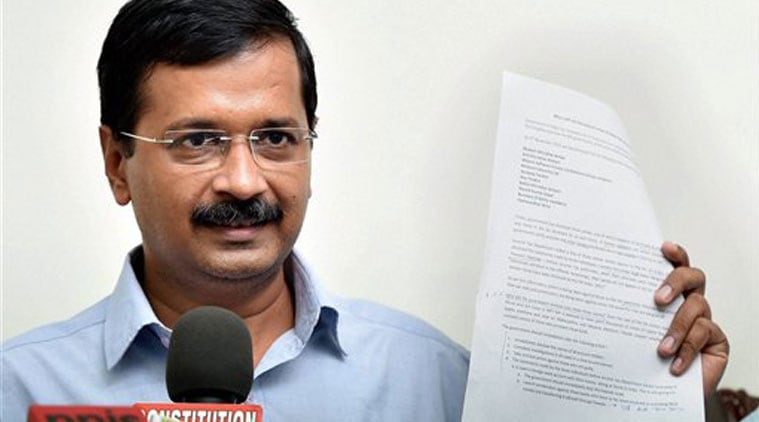Former Delhi chief minister and AAP convener Arvind Kejriwal showing the list of those who have bank accounts in foreign banks in abroad at a press conference in New Delhi on Monday. (Source: PTI photo)