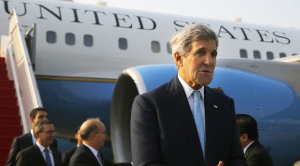 U.S. Secretary of State John Kerry arrives at the airport in Jakarta, Indonesia, on Monday Oct. 20, 2014, for the inauguration of new Indonesian President Joko "Jokowi" Widodo and meetings with other regional leaders. (Source: AP)