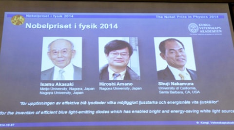 Japanese scientists Isamu Akasaki and Hiroshi Amano, and U.S. scientist Shuji Nakamura (L-R) are seen on a screen after being announced as the 2014 Nobel Physics Laureates in Stockholm. (Reuters)
