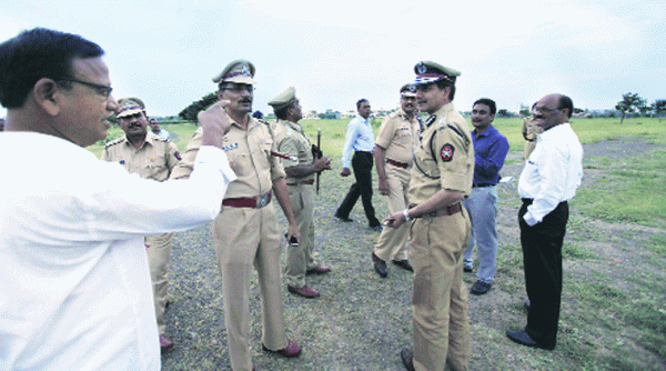 Special Protection Group and senior police personnel inspect the Baramati venue where Prime Minister Narendra Modi will attend a rally on Thursday. (Source:Express photo by Pavan khengre)