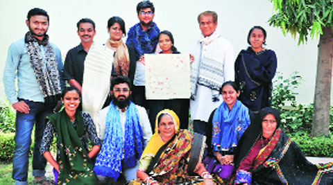 The group of 12 artisans whose works will be on display in Mumbai.