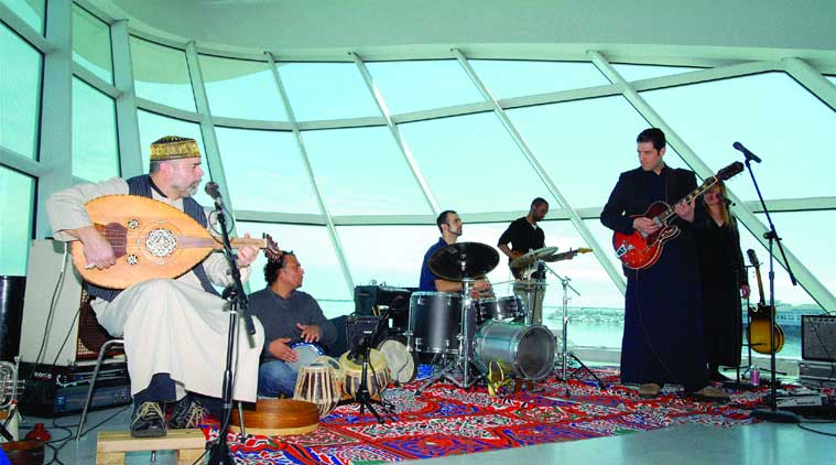 Ali Lubbad (right, in black) plays ‘primitive music for modern machine’