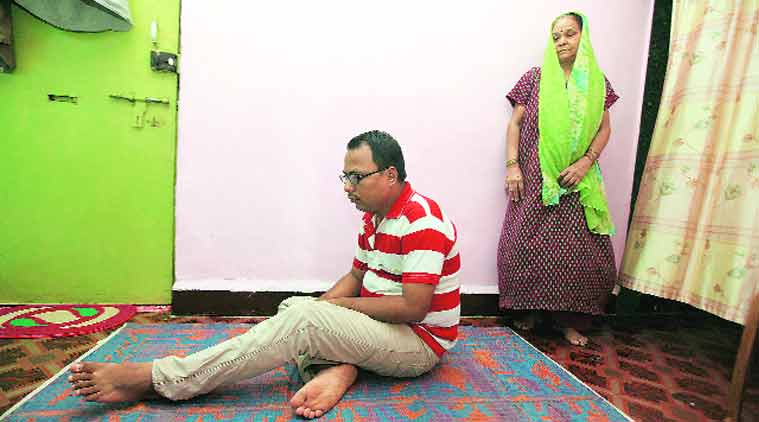 Govind and his mother at their Thane flat. (Source: Express photo by Deepak Joshi)