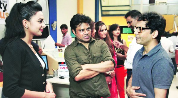 Bidita Bag, director Abhik Bhanu and Vrajesh Hirjee discuss a scene at the Sankraman studio in Mumbai