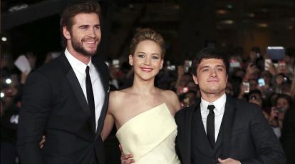 Liam Hemsworth and Josh Hutcherson attend The Hunger Games