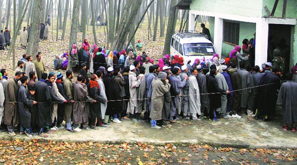 Queue outside a polling station in Ganderbal, last represented by Omar Abdullah. (Source: IE photo by Shuaib Masoodi)