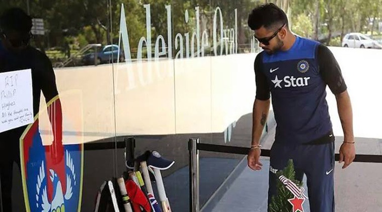 Virat Kohli, too, joined the #PutYourBatsOut tribute for Phillip Hughes (Source: The image was shared by Kohli on his Facebook page)