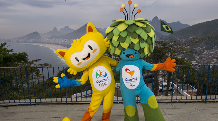 The mascots of Rio 2016 Olympic (L) and Paralympic Games pose for a photo at the Leme Fort, with Copabana beach, left, in the background. The Mascots are inspired by the Brazilian fauna and flora. (Source: AP)