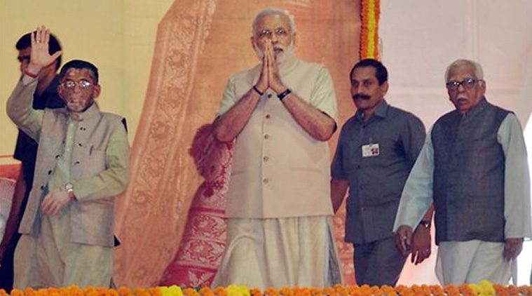 Prime Minister Narendra Modi during foundation stone laying ceremony of a trade facilitation centre for weavers in Varanasi on Friday. Minister of State for Textiles, Santosh Kumar Gangwar is also seen. (Source: PTI photo)