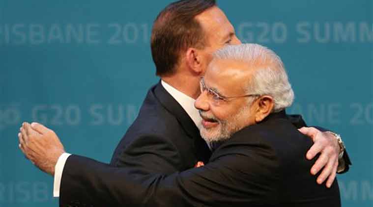 Prime Minister of Australia Tony Abbott welcomes Prime Minister of India Narendra Modi to the G-20 summit in Brisbane, Australia, Saturday. (Source: AP photo)
