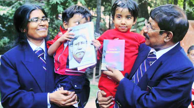 Retired IPS officer Nazrul Islam with his wife Dr Kumud Gupta and their children after launching his two books at Kolkata Press Club, Tuesday. (Source: Express photo by Partha Paul)