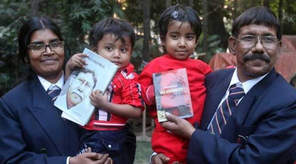 Dr. Nazrul Islam along with his wife Dr Kumud Gupta and children during the inauguration of his book at Kolkata Press club on Tuesday. (Express photo by Partha Paul)