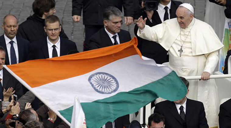 An Indian flag is waved near Pope Francis at the end of the Canonization mass. (Source: PTI)