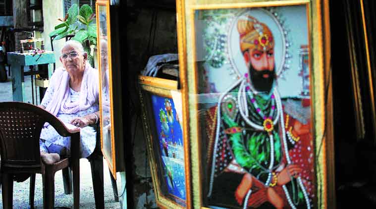 Ravial Kaur, whose son moved back to the family business of making photo frames. Now they own two shops in Tilak Vihar. (Source: Express photo by Oinam Anand)
