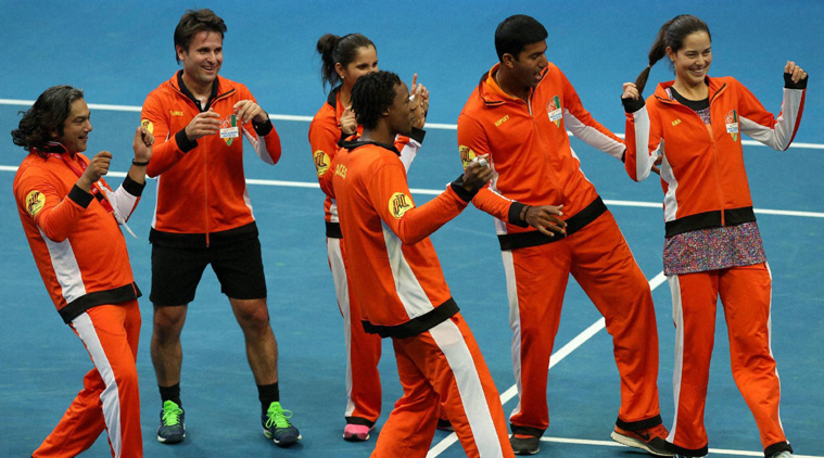 Indian Aces Gael Monfils, center, leads other team mates, from second left, Fabrice Santoro, Sania Mirza, Rohan Bopanna and Ana Ivanovic after defeating UAE Royals (Source: AP)
