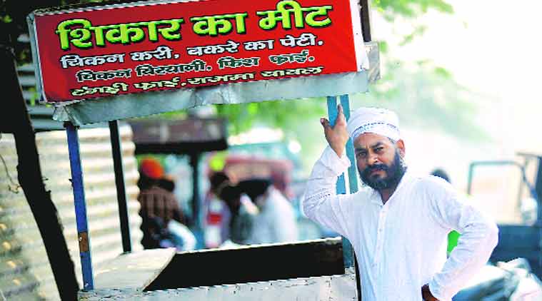 Minku Singh, who sells food from a push cart, never studied. (Source: Express photo by Praveen Khanna)