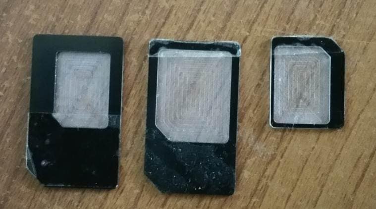 A Chinese SIM adapter. See the cello tape strips to hold the SIM in place
