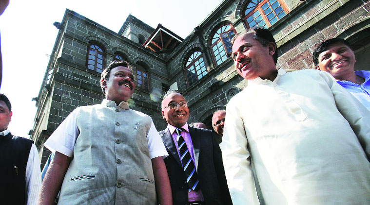 Education Minister Vinod Tawde at the Savitribai Phule Pune University on Thursday.  Vice-Chancellor W N Gade (centre) is also seen. (Source: Express photo by Arul Horizon)