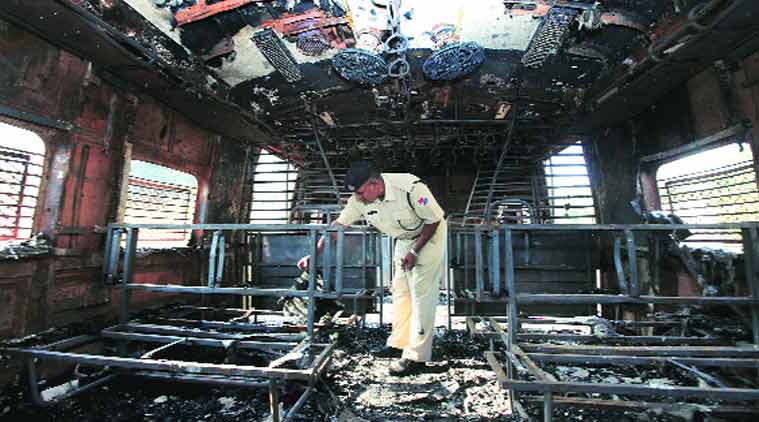 The charred coach. The fire was reported at 1.10 pm and it took the fire personnel 30 minutes to douse the flames. No one was injured. (Source: Express photo by Deepak Joshi)