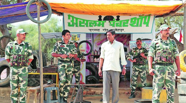 Adil Hussain surrounded by security guards led by Rahul Singh