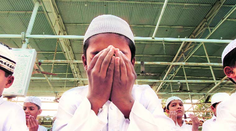 In Surat and Navsari, students from schools and madrassas observed silence along with their teachers. (Express photo by Javed Raja)