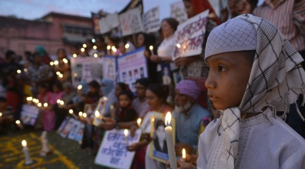Survivors of Bhopal Gas Disaster take part in candle light vigil to pay tribute to mark the 30th anniversary of Bhopal Gas tragedy. (Source: PTI Photo)