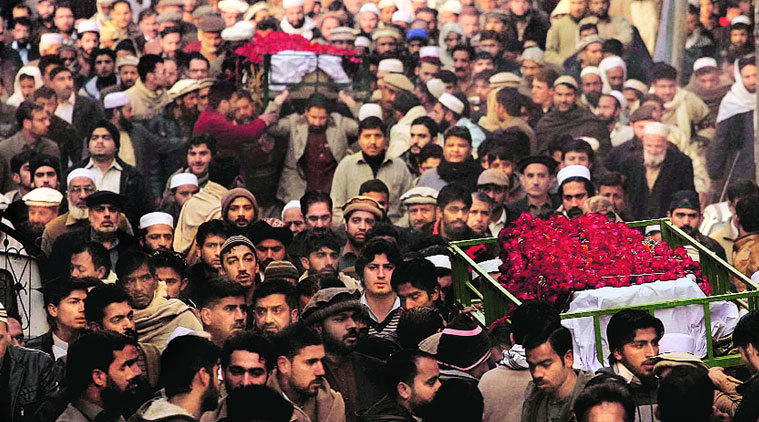 Families attend the funeral of students in Peshawar on Wednesday; (top right) a Lahore schoolgirl at a prayer meeting. (Source: AP photo)