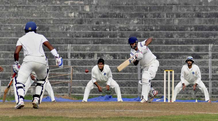  Arun Karthik in action on the 1st day of the Ranji Trophy between Assam and Jharkhand at Nehru Stadium in Guwahati. (Source: PTI)