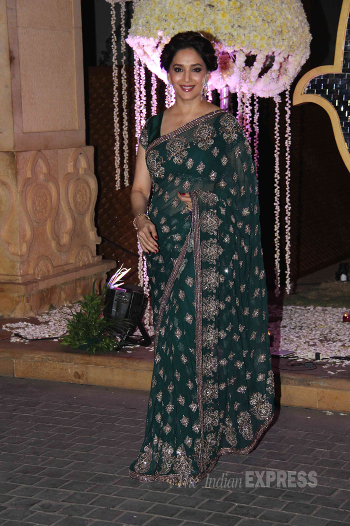 Madhuri Dixit went the sari route in a green Manish Malhotra creation. (Source: Varinder Chawla)