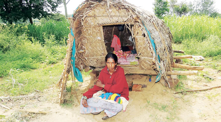 A new mother forced to live in a small outhouse after her delivery, in Durga Hosahalli village. (Source: Express photo)