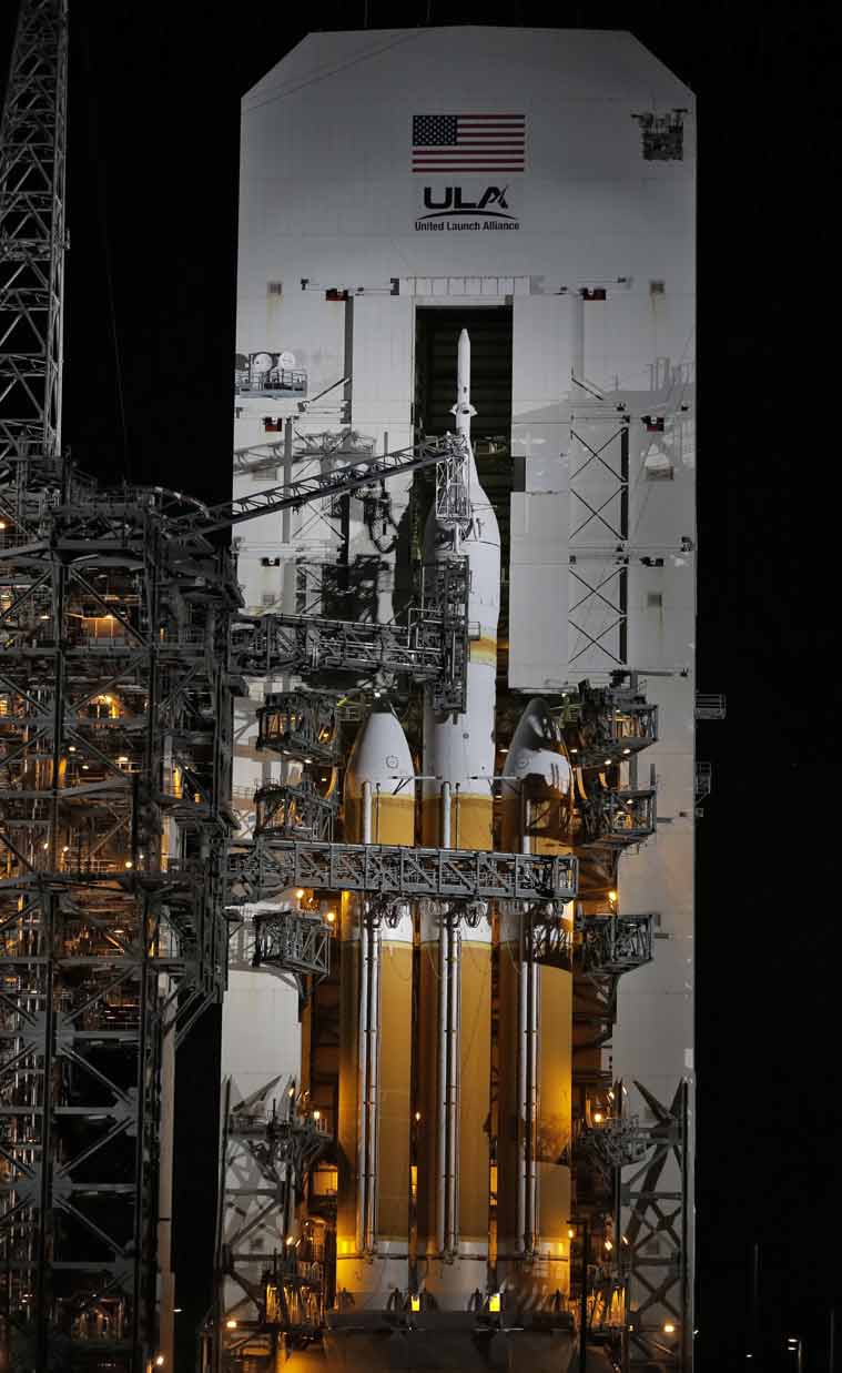 The service structure is rolled away from NASA's Orion spaceship late Wednesday, Dec. 3, 2014, in Cape Canaveral, Fla. (Source: AP)