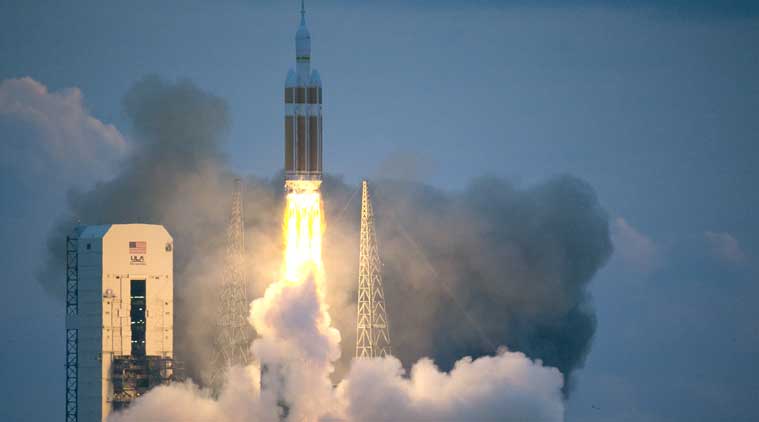 The unmanned spacecraft soared into space at 7:05 am (0535 IST) atop a United Launch Alliance Delta IV Heavy rocket that rumbled and roared as it climbed into pastel skies over the Florida coast at sunrise, leaving a plume of smoke in its wake. (Source: AP photo)