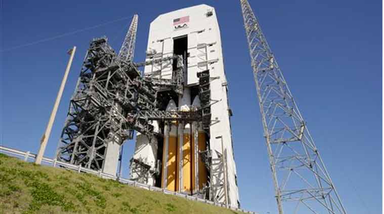 The NASA Orion space capsule is seen atop a Delta IV rocket ready for a test launch at the Cape Canaveral Air Force Station, Wednesday, Dec. 3, 2014, in Cape Canaveral, Fla. (Source: AP)