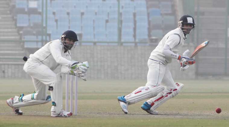 Chand reached the half-century mark first, in the 34th over - an edge through the slips. (Express photo by Amit Mehra)