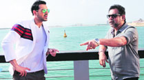 A comedy scene which had John Abraham blackmailing Dimple Kapadia and her daughter,  played by newcomer  Ankitaa Srivastav, was shot at  a jetty in Dubai. Here director Anees Bazmee is seen briefing the actor. 