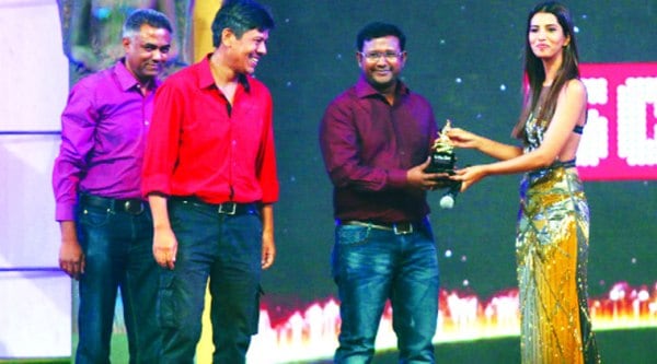 Anil Khobargade andPrabal Pradhan receive the Award from Manasvi Mamgai