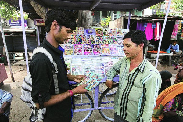 Checking out Bhojpuri CDs at the local market