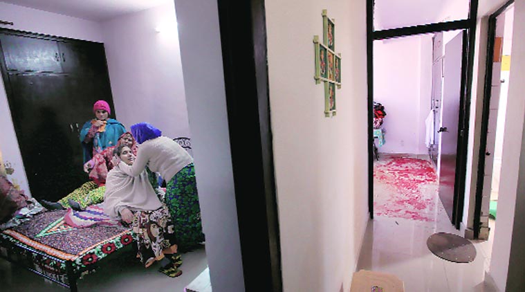 The room where the woman was found bleeding and the dead man’s disconsolate mother; the couple last year. ( Source: Express Photo By Ravi Kanojia)